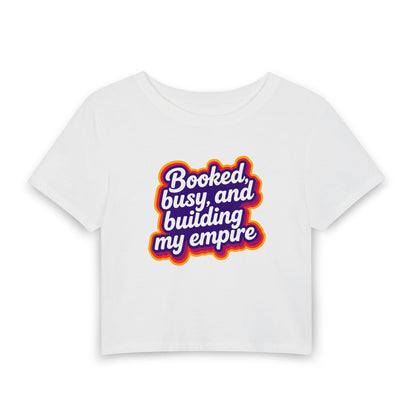 Booked, busy, and building my empire Crop Tee