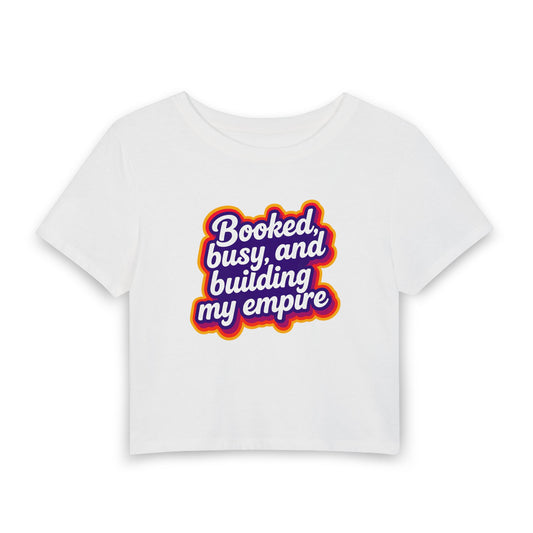 Booked, busy, and building my empire Crop Tee