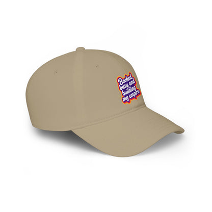 Booked, busy, and building my empire Baseball Cap