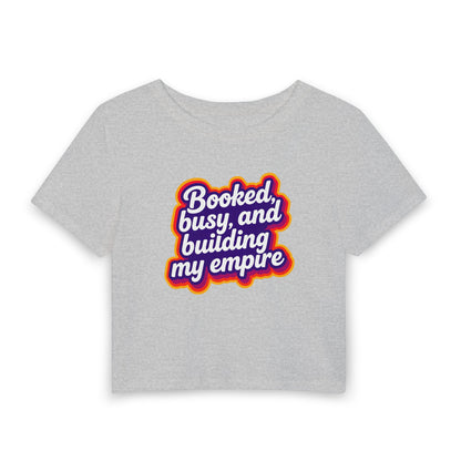 Booked, busy, and building my empire Crop Tee